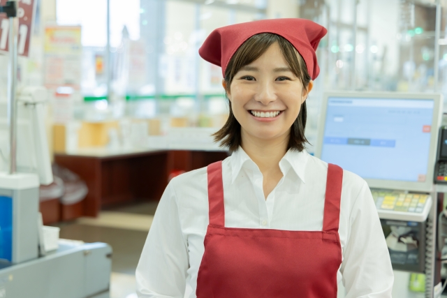Smiling staff member at a Japanese supermarket, where product demo jobs are available in LA and OC